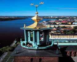 Stockholm City Hall has a 106 meter long Tower on its South and at the top of the tower, are set up three crowns which represent the national symbol o